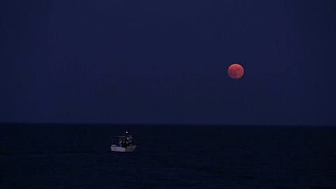 Watch: Full moon casts a glow by Greece's Koroni castle