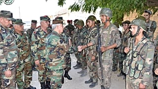 General Ali Abdullah Ayyoub, Syria's Defense Minister visits army soldiers in al-Hobeit in Idlib province