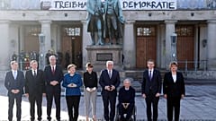 German Chancellor Angela Merkel and President Frank-Walker Steinmeier pose with other dignitaries at an event to mark 100 years since the Weimar constitution was signed in 191