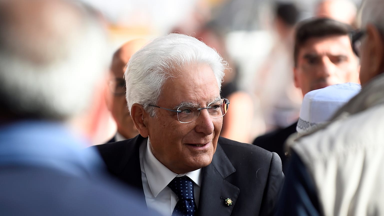 Italy's president holding talks to find new government after Conte quits