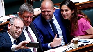 N-VA party members De Roover, Jambon, Francken and Demir pose for a selfie during a plenary session of the Belgian Parliament in Brussels