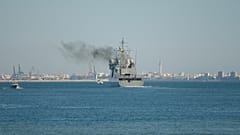 Watch again: Spanish warship Audaz arrives off Lampedusa coast to collect 15 migrants