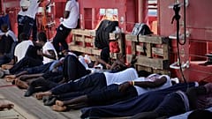 Rescued migrants rest aboard the Ocean Viking. Picture taken between August 9 and 12, 2019.