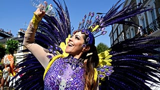 Notting Hill Carnival parade performer in the heat