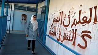 طالية في مدارس الأمم المتحدة في الضفة الغربية- أرشيف رويترز