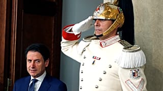 Italian Prime Minister Giuseppe Conte arrives to speak to the media after meeting with Italian President Sergio Mattarella