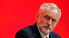 The Leader of Britain's opposition Labour Party, Jeremy Corbyn listens to a speech on the first day of the Labour Party conference, in Liverpool, Britain September 25, 2016. 