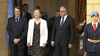 Greek and Turkish-Cypriot leaders discuss a resumption of peace talks
