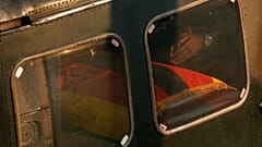 Robert Mugabe Junior's hands are seen near a casket carrying the remains of his father, Robert Mugabe.