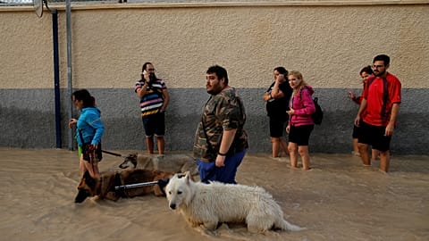 Emergency workers rescue baby amid severe flooding in southeastern Spain