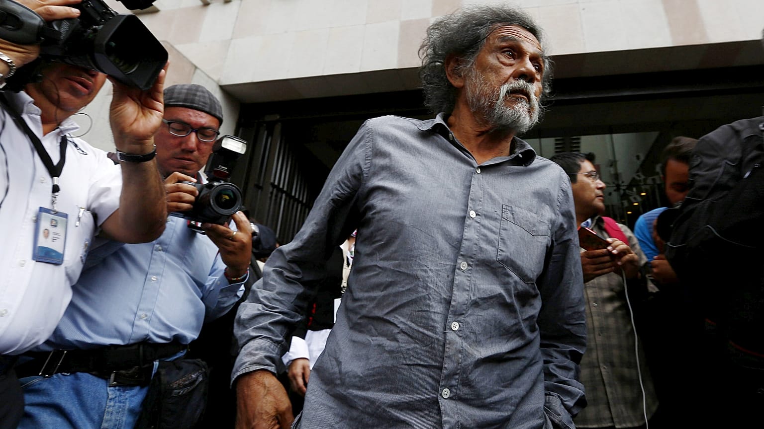 Mexican graphic artist Francisco Toledo arrives for an exhibition of kites with pictures of the 43 missing students of the Ayotzinapa Teacher Training College in Mexico City.