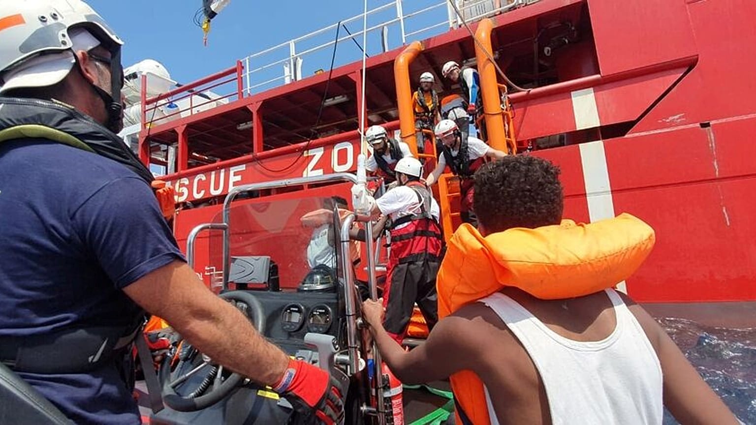 Rescued migrants and Ocean Viking staff members pictured  between August 9 and 12, 2019.