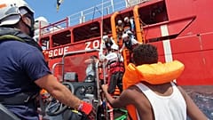 Rescued migrants and Ocean Viking staff members pictured  between August 9 and 12, 2019.