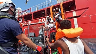 Rescued migrants and Ocean Viking staff members pictured between August 9 and 12, 2019.
