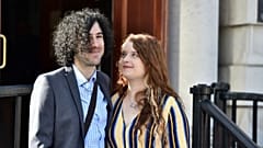 Emma DeSouza and her husband Jake outside the Upper Tribunal