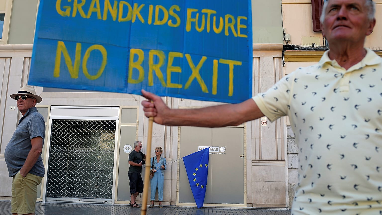 A man holds a banner as British residents in Spain take part in an anti-Brexit demonstration, in Malaga, Spain September 22, 2019. 