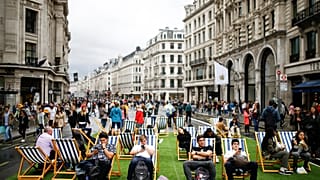 People relax on deck chairs on Regent Street after it was shut as part of 'Car Free Day' in London, Britain, September 22, 2019.