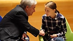 Secretary-General of the United Nations Antonio Guterres shakes hands with Swedish environmental activist Greta Thunberg, ew York, U.S., September 21, 2019 