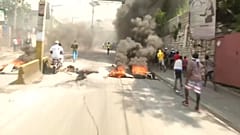 Clashes continue in Haiti after senator fires pistol 