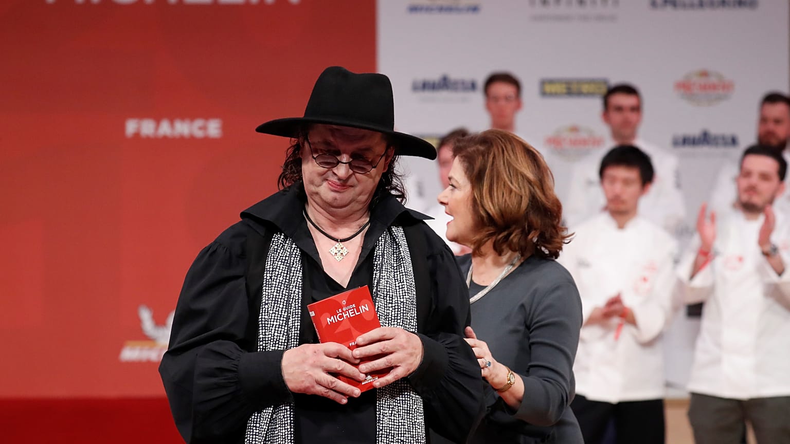 FILE PHOTO: French chef Marc Veyrat reacts after he was awarded with three Michelin stars for his restaurant La Maison des Bois in Manigod, February 5, 2018. 