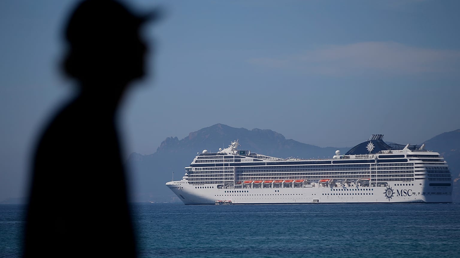 A cruise shipped docked in the bat at Cannes, France