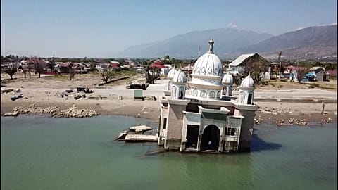 Drone images show damage one year after Indonesia earthquake, tsunami