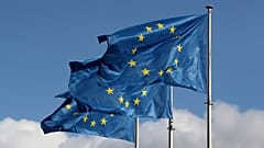 European Union flags fly outside the EU Commission headquarters in Brussels, Belgium 