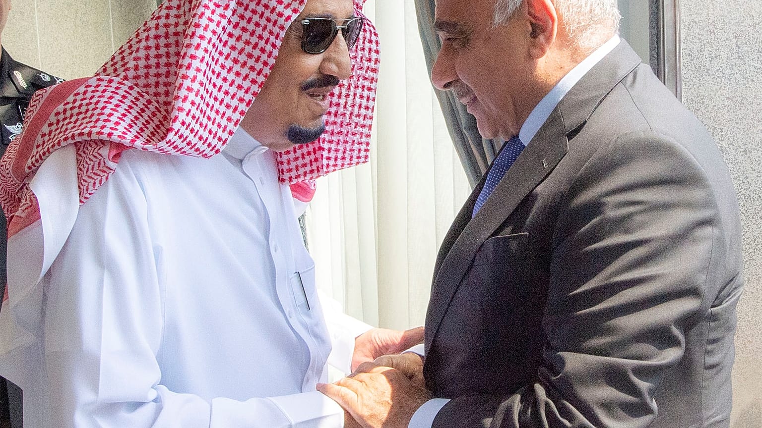 Prince Salman of Saudi Arabia, pictured here with the Iraqi prime minister (right) 