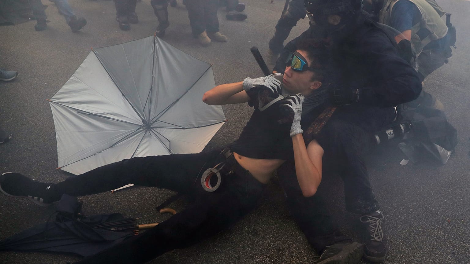 Police use tear gas at anti-China protest in Hong Kong