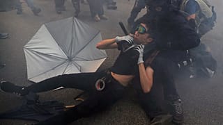 Police use tear gas at anti-China protest in Hong Kong