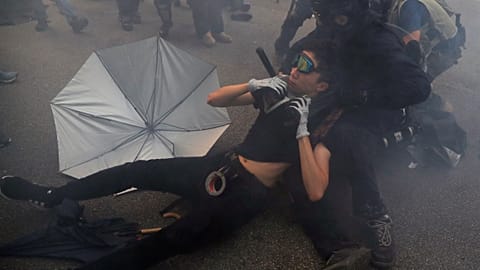 Police use tear gas at anti-China protest in Hong Kong