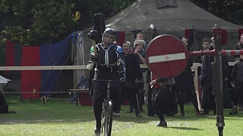 Knights participate in jousting contest on bikes in Berlin