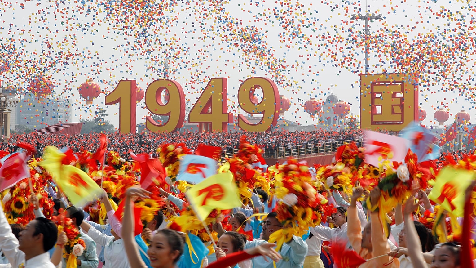 Balloons are seen above performers at the end of the parade marking the 70th founding anniversary of People's Republic of China