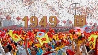 Balloons are seen above performers at the end of the parade marking the 70th founding anniversary of People's Republic of China