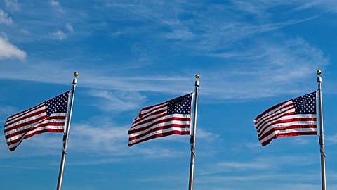 American flags fly at the Washington Monument, after a 37-month closure in Washington