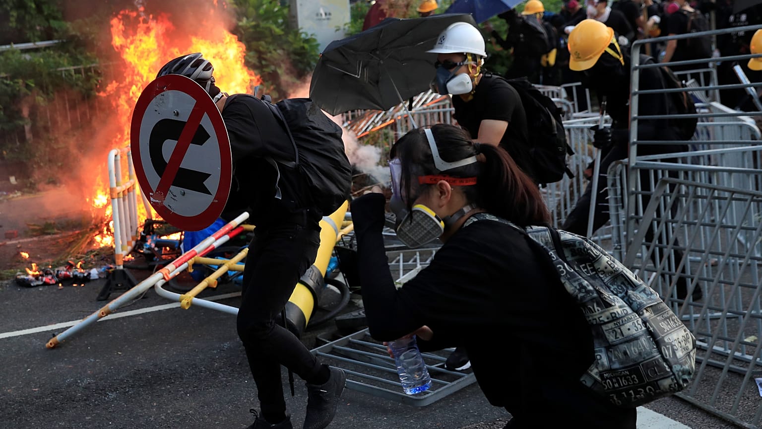 Hong Kong police break up protests in day of violence 