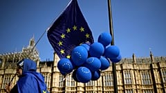 Anti-Brexit protesters are seen outside the Houses of Parliament in London, Britain April 10, 2019.