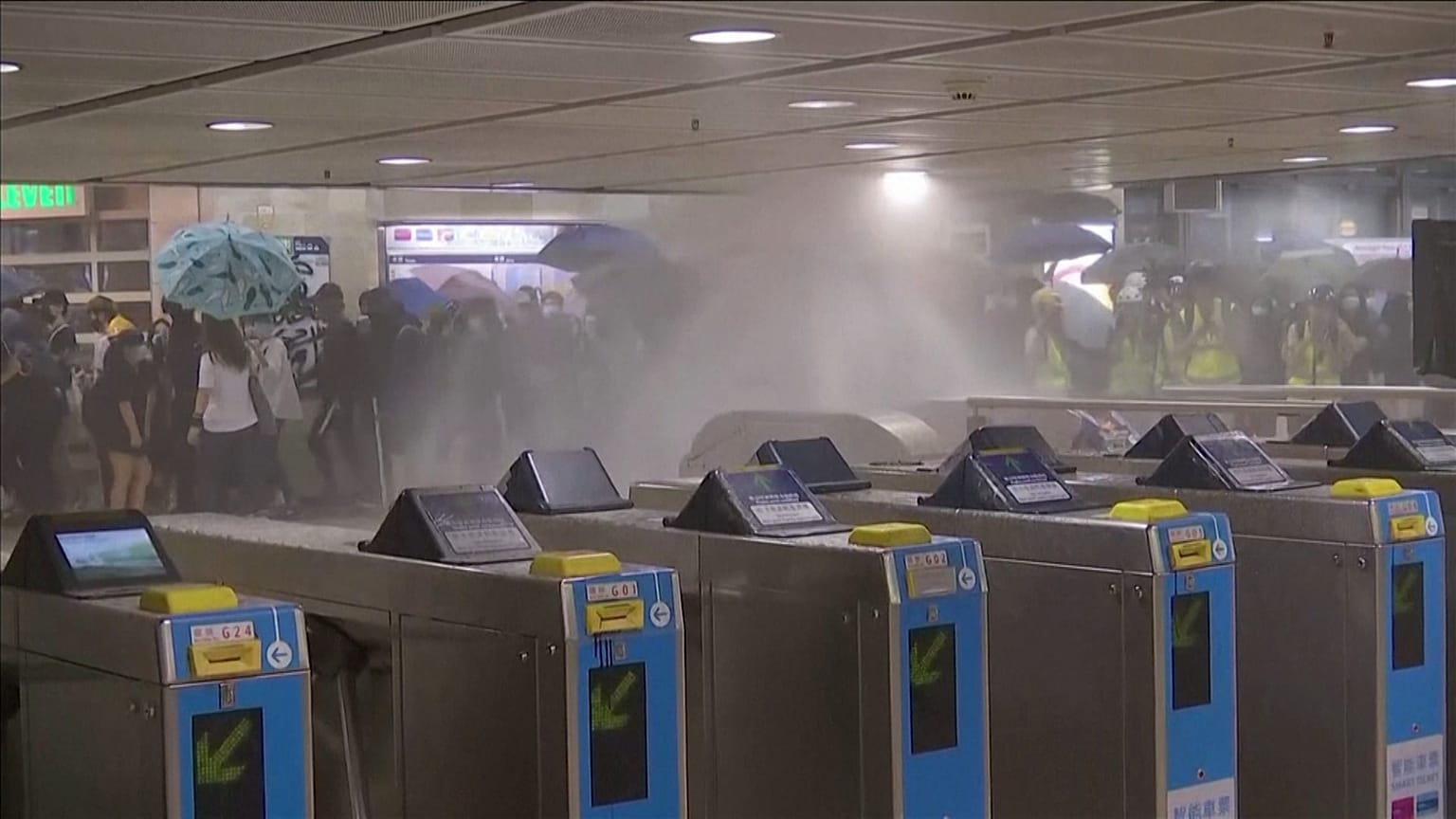 Hong Kong: Protesters target station amid anger at face-mask law
