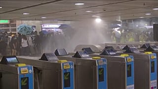 Hong Kong: Protesters target station amid anger at face-mask law