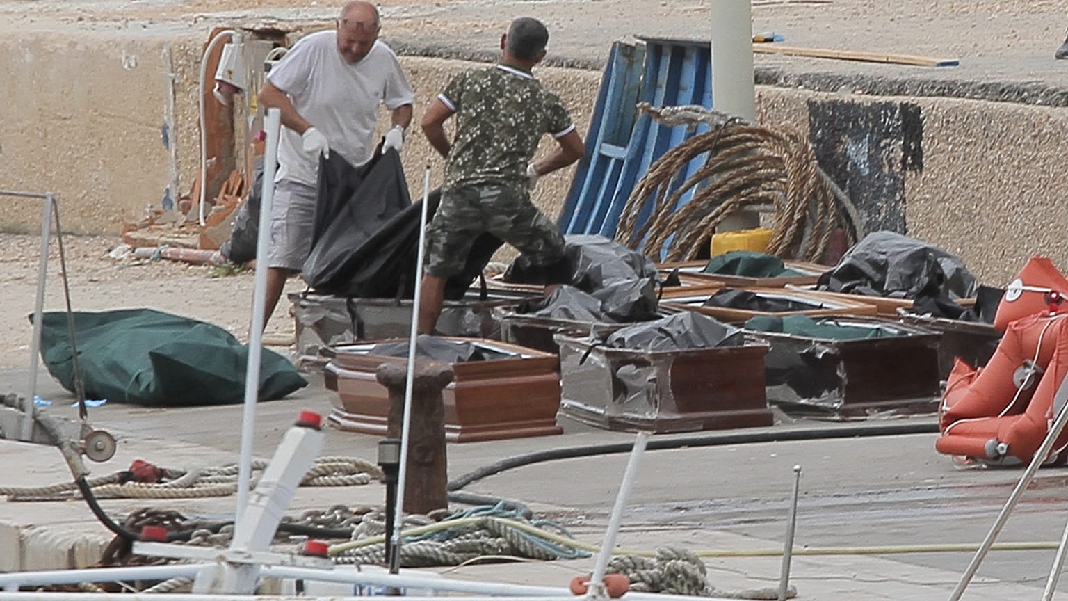 More than a dozen bodies recovered after migrant boat capsizes in the Mediterranean
