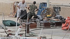 More than a dozen bodies recovered after migrant boat capsizes in the Mediterranean