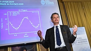 Ulf Danielsson, member of the Nobel committe announces the winners of the 2019 Nobel Prize in Physics during a news conference at the Royal Swedish Academy of Sciences.