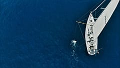 Here the trawler that catches ocean plastic for research can be seen next to the ship