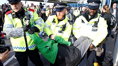 Extinction Rebellion tries to shut down London airport 