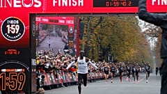 enya's Eliud Kipchoge, the marathon world record holder, crosses the finish line during his attempt to run a marathon in under two hours in Vienna, Austria, October 12, 2019.