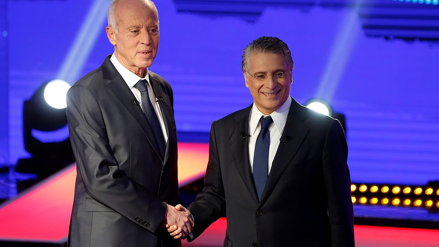 مرشحا الرئاسة التونسية قيس سعيد ونبيل القروي قبل مناظرتهما التلفزيونية 11 أكتوبر 2019