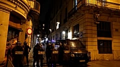 Police officers stand guard outside the Government Delegation building, after a verdict in a trial over a banned independence referendum, in Barcelona