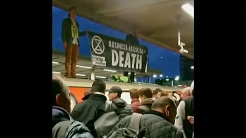 Climate protesters clash with commuters in London