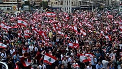 Demonstrators take part in an anti-government protest in Tripoli