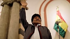 Evo Morales reacts after the results for the first round of the country's presidential election were announced